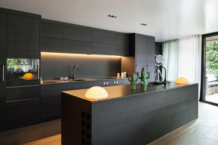 Black granite countertops in a modern kitchen